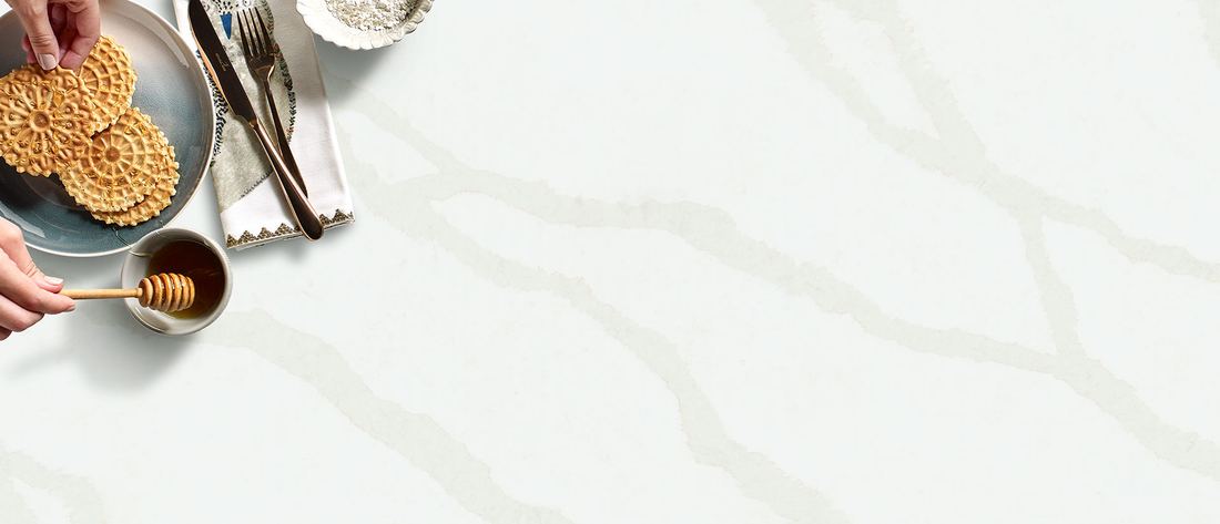 Calacatta Belaros quartz countertops installed in a home