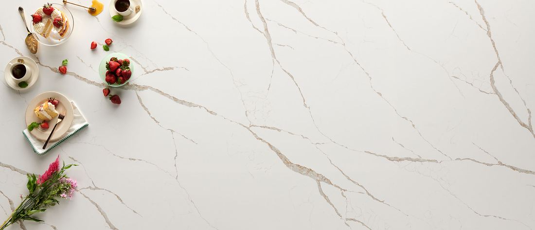 Calacatta Laza Oro quartz countertops installed in a home