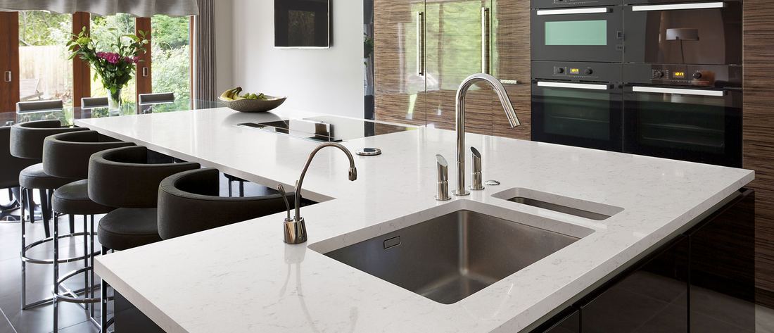 New Carrara Marmi quartz countertops installed in a home