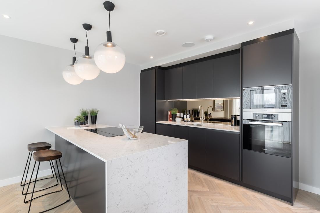 White Arabesque quartz countertops installed in a home