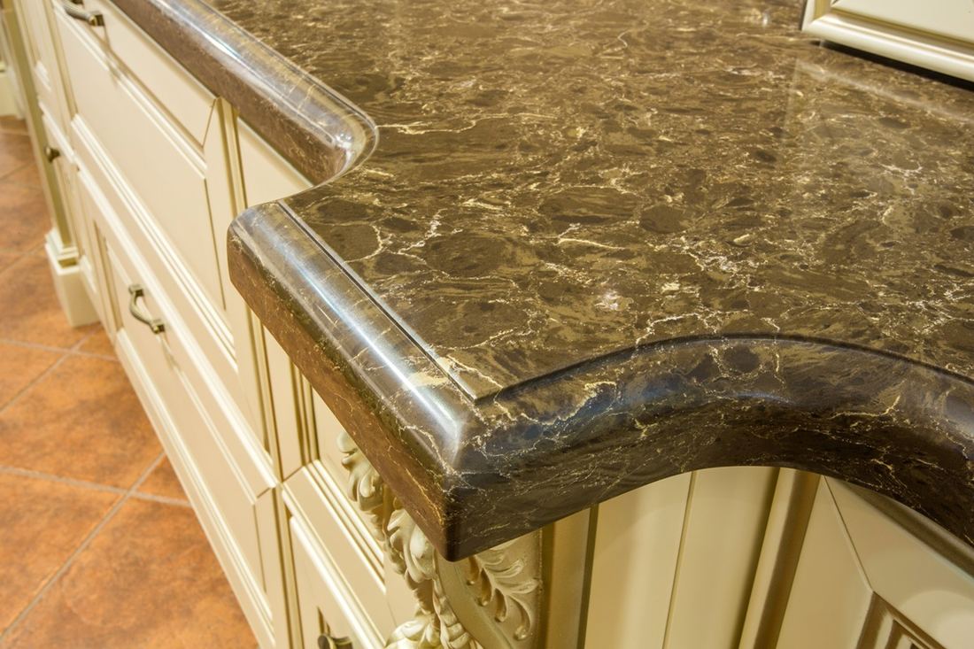 Dark Emparador quartz countertops installed in a home
