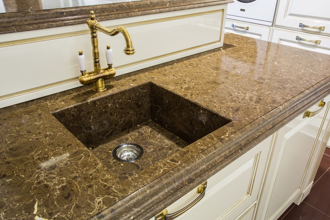 Dark Emparador quartz countertops installed in a home